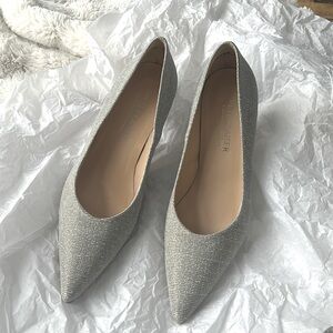 Prestine condition silver pumps